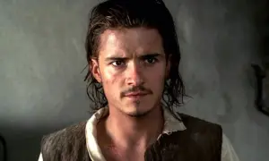 Will Turner, parte del cast di La maledizione della prima luna, con capelli scuri e un'espressione intensa.