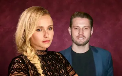 Hayden Panettiere oggi, con un uomo sullo sfondo. Lei indossa un abito di pizzo nero.