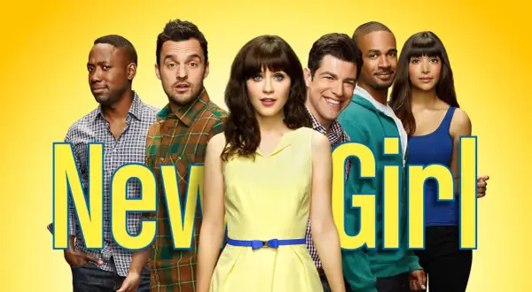 Il cast di New Girl, con Jess al centro in giallo, circondata dai suoi amici.